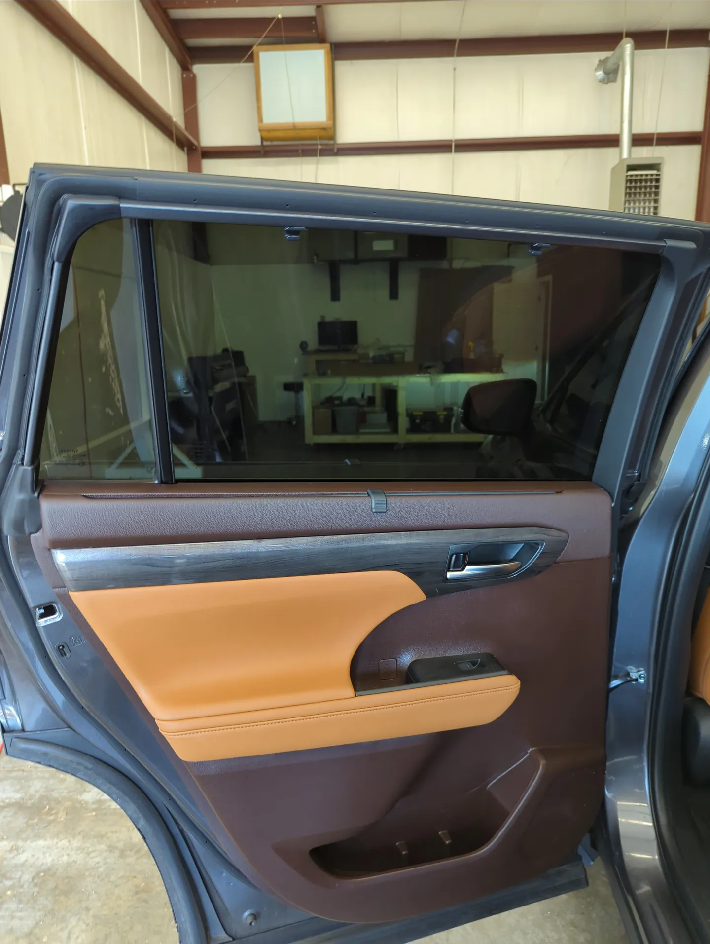 process of window tinting at Black Bear Protective Film